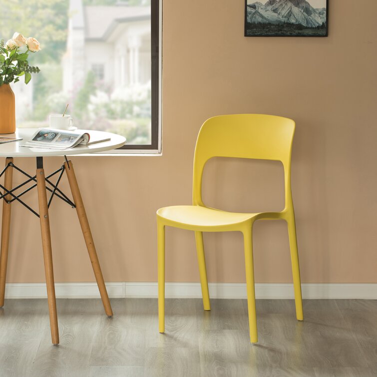 Yellow plastic 2025 dining chairs